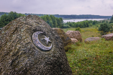 Muslim emblem on so called Ecumenical Hill near Kruszyniany, small village in Podlaskie Province of Poland - obrazy, fototapety, plakaty