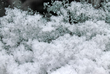 melting snow on the glass. sleet on glass