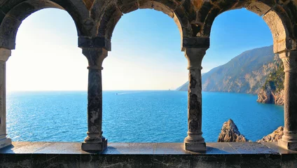 Keuken foto achterwand Liguria Romantic look at Portovenere on mediterranean sea through a historic medieval stone arch windows. Liguria . Italy