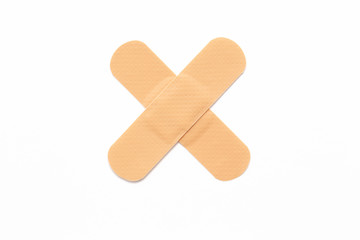 Medical adhesive plaster on white background. First-aid  