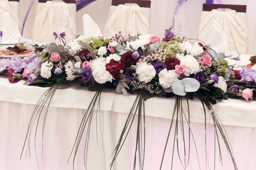 beautiful rustic bouquets flowers at wedding centerpiece for bride groom setting in restaurant, luxury wedding reception, stylish decor