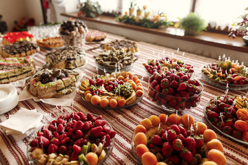 delicious fruit table at wedding reception, luxury catering in restaurant