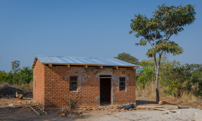 Fototapeta na wymiar Basic mud, bricks buildings and schools in Zambia
