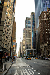Fototapeta na wymiar New York, USA, May 3rd 2013. Taxi in the streets of Manhattan