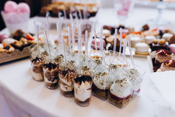 Sweet desserts on the festive table. Sweet buffet.
