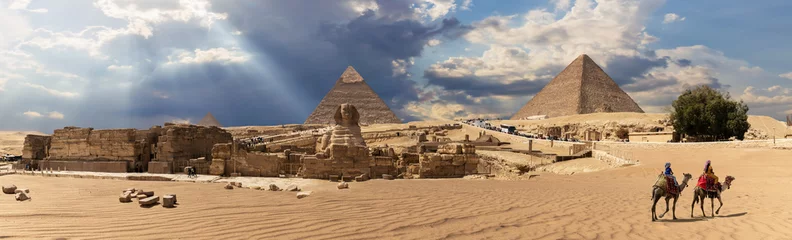 Foto op Canvas Panorama of the Giza Pyramid complex in Egypt, cloudy day view © AlexAnton