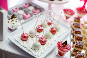 Colorful cake pops on candy buffet