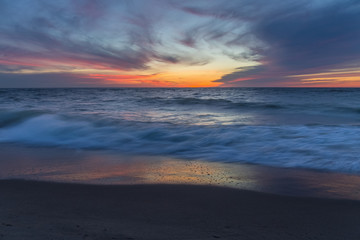 Fototapeta na wymiar Sunset on the Baltic seacoast. Curonian Spit