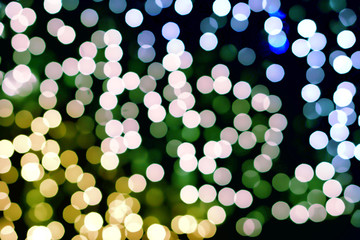Blurred and bokeh of cool colors tone led lighting in full screen and black background.