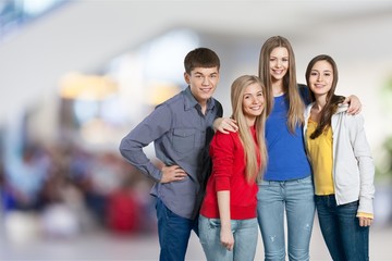 Obraz premium Group of students gesturing thumbs up on