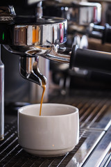 cup of coffee and machine