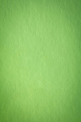 Close up paper texture background. Abstract seamless green pattern. Rag ultra smooth.