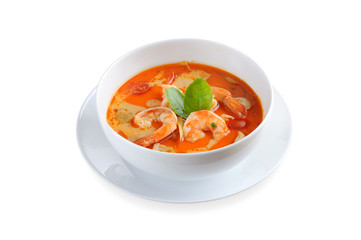 Tom Yum Kung Thai hot spicy shrimp soup with lemon grass, lemon and galangal isolated on white background
