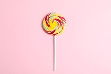 Sweet candy with space for text on color background, top view