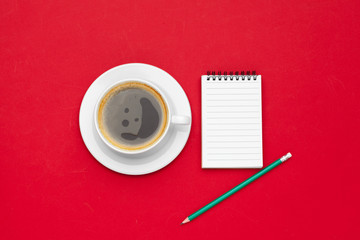 Modern workplace with cup of coffee, top view