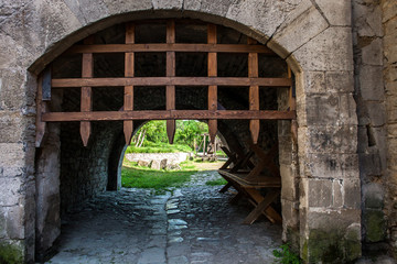 Medieval wooden grid gate to ancient castle