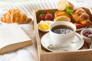 Morning breakfast in bed with coffee
