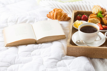 Morning breakfast in bed with coffee