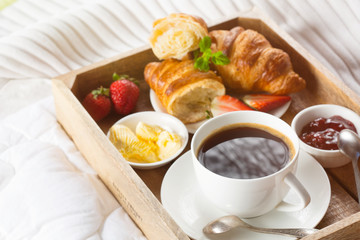 Morning breakfast in bed with coffee