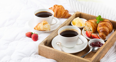 Morning breakfast in bed with coffee