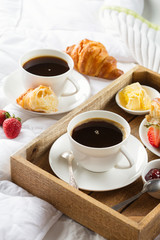 Morning breakfast in bed with coffee