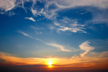 blue sky with clouds and sunset orange