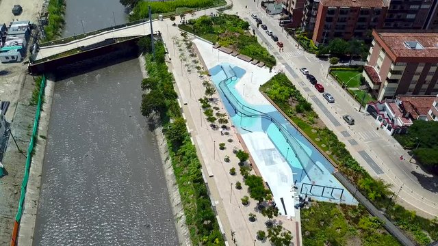 Arial tilting shot of Parques del R&iacute;o Medell&iacute;n, Colombia