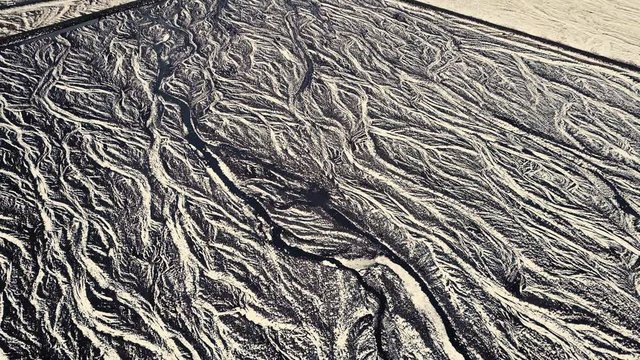 Drone showing beautiful patterns in the landscape below, on snowy conditions. Different angles, and cinematic moves. DJI Mavic Pro