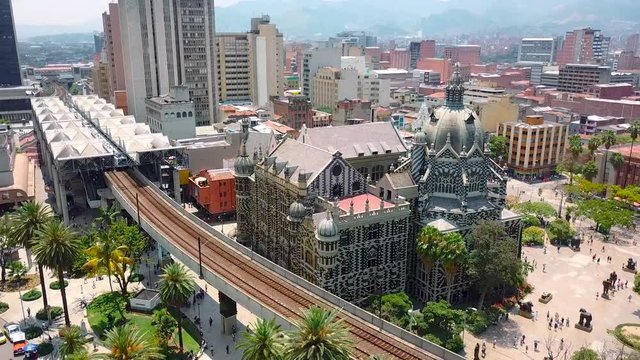 Beautiful revealing shot of Botero square and metro station in Medellin