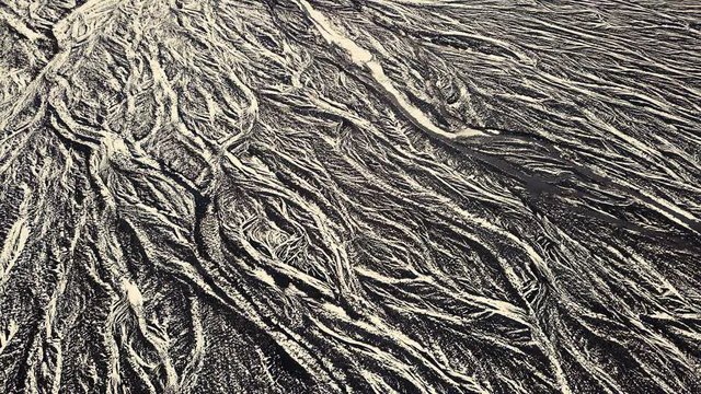 Drone showing beautiful patterns in the landscape below, on snowy conditions. Different angles, and cinematic moves. DJI Mavic Pro