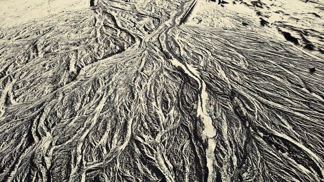 Drone showing beautiful patterns in the landscape below, on snowy conditions. Different angles, and cinematic moves. DJI Mavic Pro