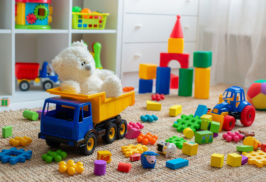 Children's playroom with plastic colorful educational blocks toys. Games floor for preschoolers kindergarten. interior children's room.