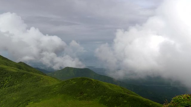 Surreal shot of clouds rolling over the mountainside of La Soufri&egrave;re volcano in Guadeloupe