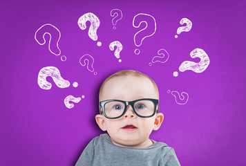 thinking baby with question marks on  background