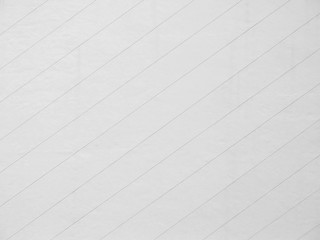 white wall outside the building with lines