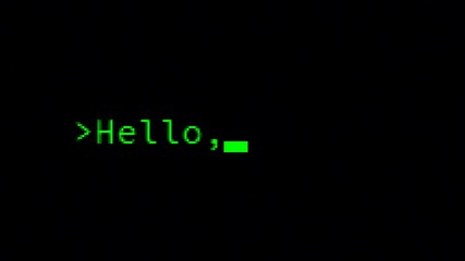 Typing the classical programmers' greeting message, Hello World, on a computer terminal. Green characters, black background, zoomed-in.