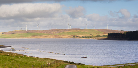 Llyn Brenig reservoir with the Clocaenog wind farm on the Denbigh moors North Wales it is the fourth largest lake in Wales