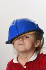 child with a construction helmet