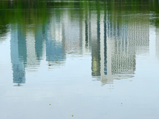 water reflection with building in city