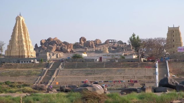 Static shot of Virupaksha, a lord Shiva avatar, Temple in Hampi in the Ballari district of Karnataka. Designated as UNESCO World Heritage group of monuments seen from across the river