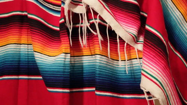 poncho Mexican cinco de mayo rug serape fiesta traditional Mexico background with stripes copy space maya blanket minimal simple