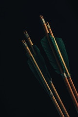 Four wood arrow. Beautiful smog background. Medieval weapons are handmade.