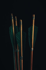 Four wood arrow. Beautiful smog background. Medieval weapons are handmade.