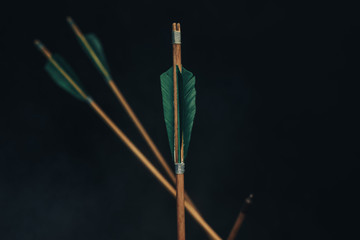 Four wood arrow. Beautiful smog background. Medieval weapons are handmade.