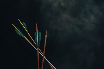 Four wood arrow. Beautiful smog background. Medieval weapons are handmade.