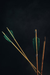 Four wood arrow. Beautiful smog background. Medieval weapons are handmade.