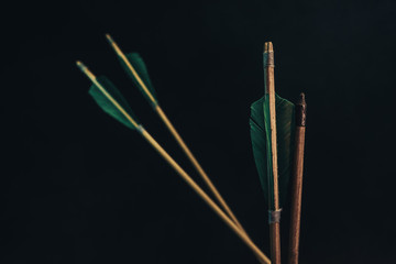 Four wood arrow. Beautiful smog background. Medieval weapons are handmade.