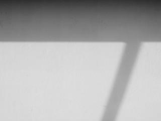 shadow on white wall black and white style