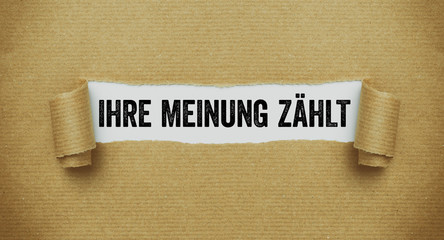 Braunes zerissesnes Papier - Ihre meinung zählt