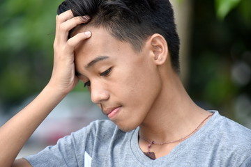 Teen Boy And Sadness